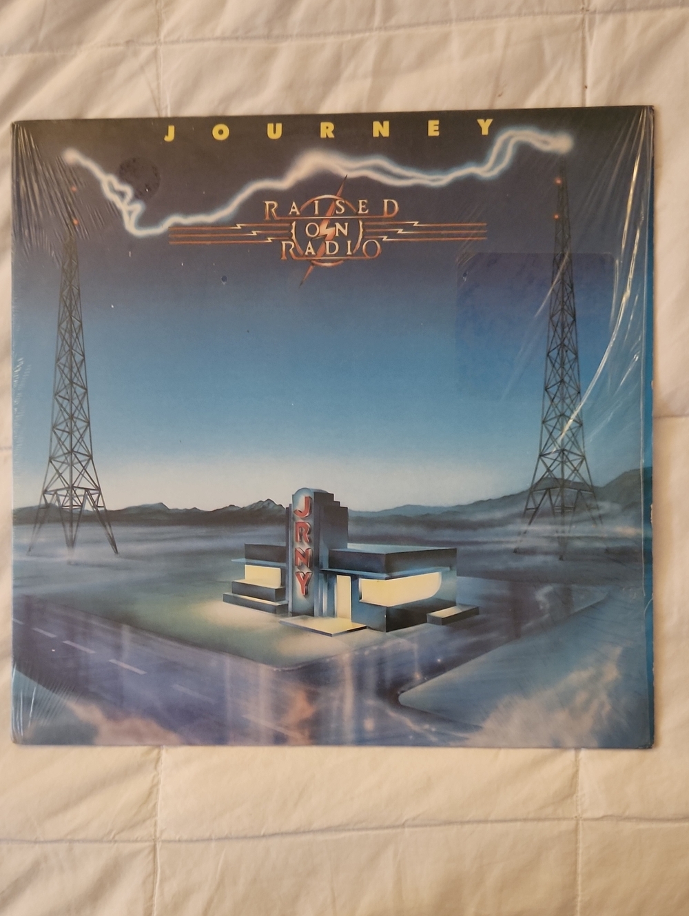 Journey "Raised On Radio" Vinyl Album - 95% Sealed Side Open. NEVER PLAYED EX